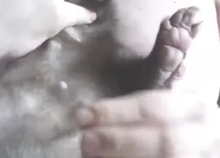 Lady fingering a skunk in this short horny clip